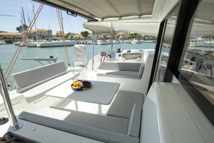  Yacht Photos Pics Manufacturer Provided Image: Luxurious 2026 Excess 11 yacht with spacious deck and marina view.