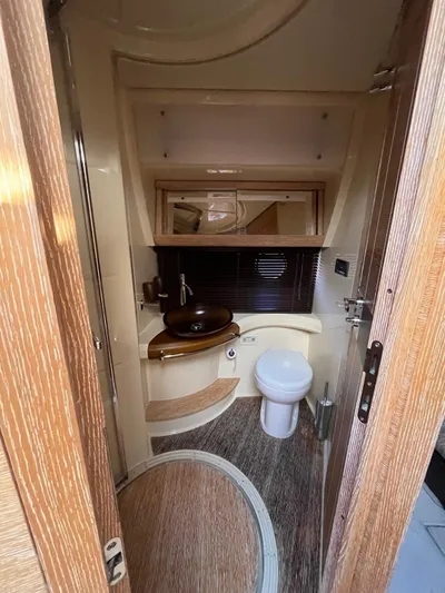  Yacht Photos Pics Luxurious bathroom interior of 2014 Azimut 48 yacht, featuring modern fixtures and elegant design.