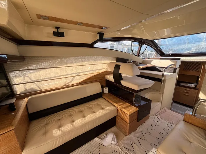  Yacht Photos Pics Luxurious interior of a 2014 Azimut 48 yacht with elegant seating and modern design.