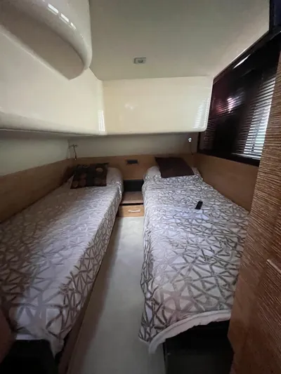  Yacht Photos Pics Interior cabin of 2014 Azimut 48 yacht with twin beds and modern decor.
