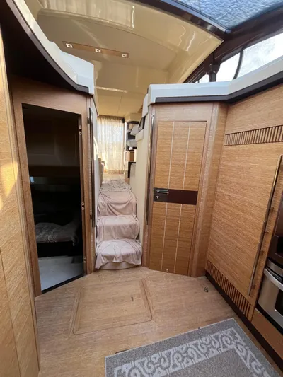  Yacht Photos Pics Interior of 2014 Azimut 48 yacht with wooden finish and staircase.