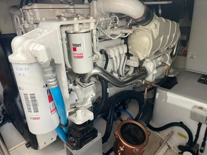 Yacht Photos Pics Engine room of a 2014 Azimut 48 yacht, featuring detailed mechanical components.