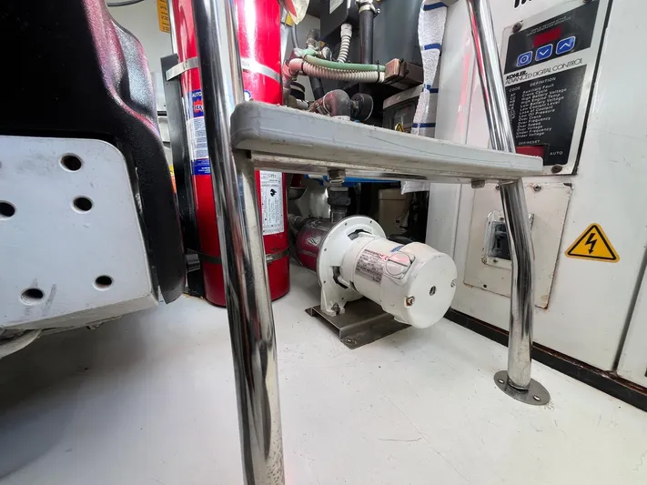  Yacht Photos Pics Engine room of 2014 Azimut 48 yacht with fire extinguisher and control panel.