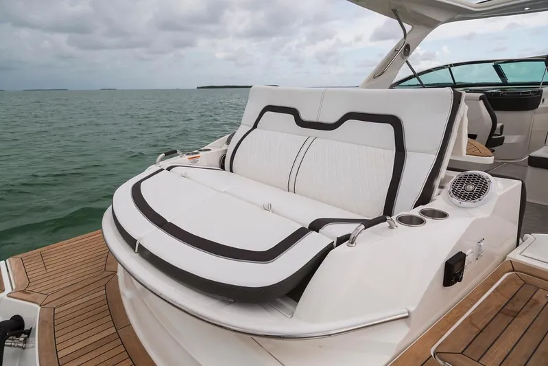  Yacht Photos Pics Manufacturer Provided Image: 2017 Sea Ray SLX 350 boat with luxurious seating on deck.