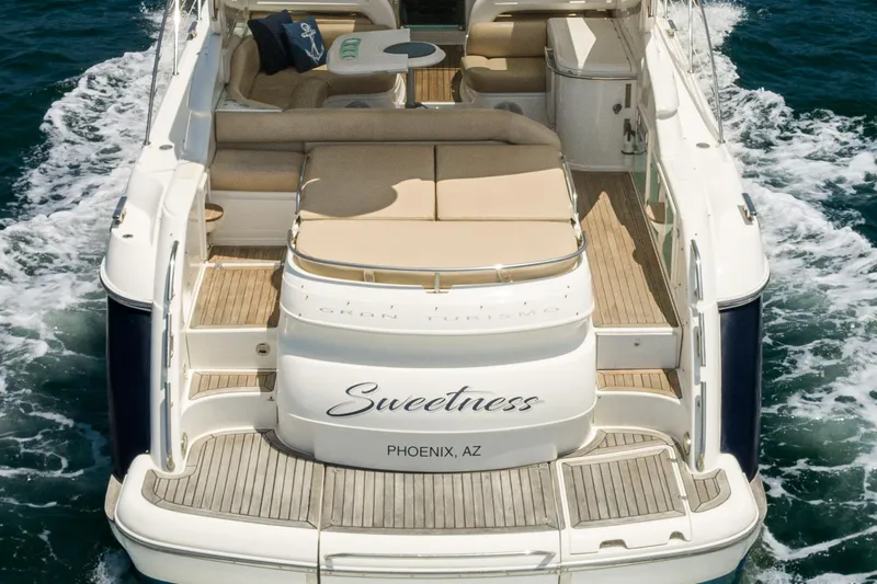  Yacht Photos Pics Fairline 48 Targa yacht, 2000 model, named "Sweetness," cruising on the ocean.