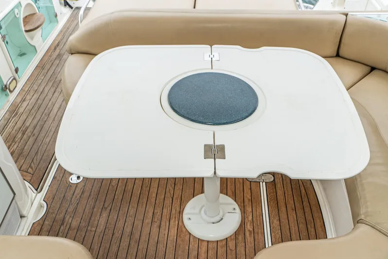  Yacht Photos Pics Fairline 48 Targa 2000 yacht interior with beige seating and wooden flooring.