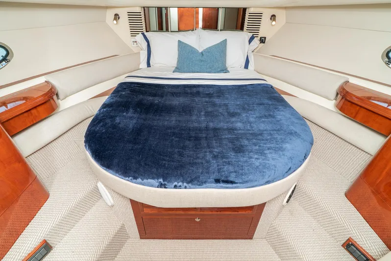 Yacht Photos Pics Luxurious cabin interior of 2000 Fairline 48 Targa yacht with plush bedding.