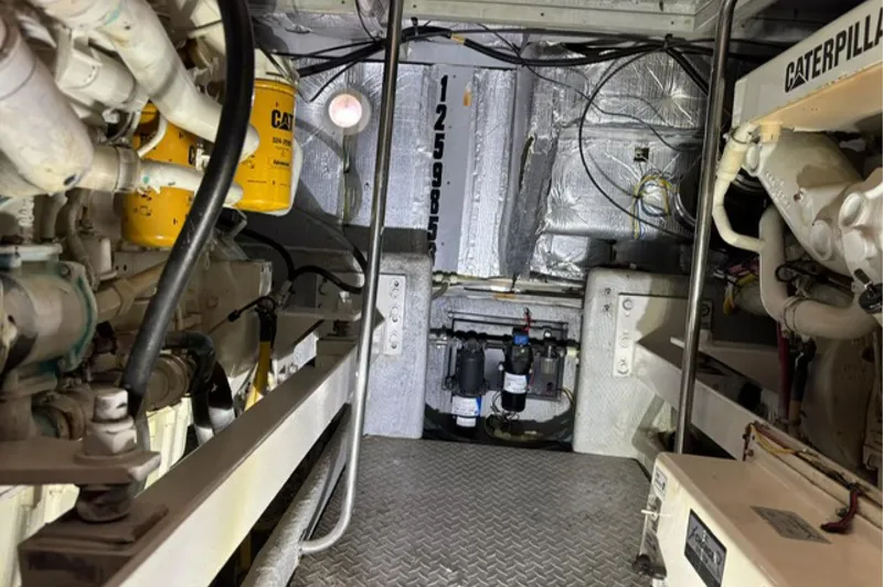 Just Blessed Yacht Photos Pics Engine room of a 2002 Silverton 43 Motor Yacht with Caterpillar components.