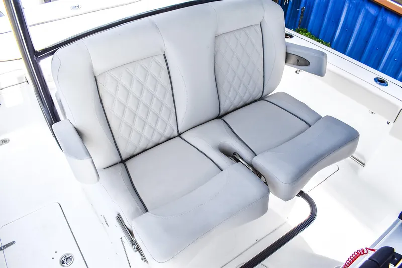  Yacht Photos Pics Luxurious seating on 2026 Sea Hunt Ultra 285 Coffin Box boat, featuring diamond-stitched upholstery.