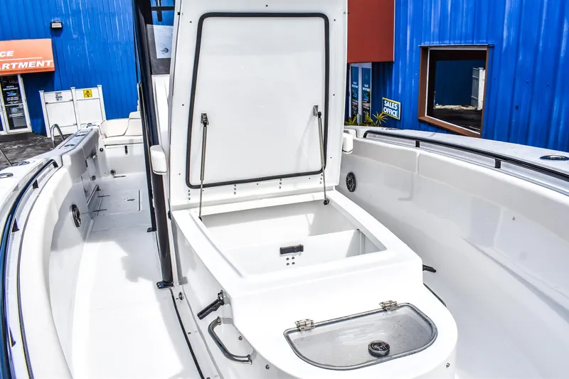  Yacht Photos Pics 2026 Sea Hunt Ultra 285 Coffin Box boat interior with open storage compartment.