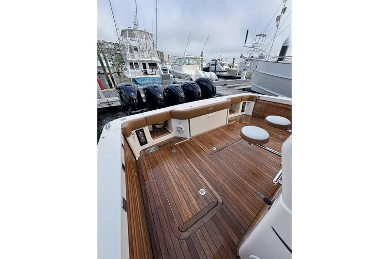  Yacht Photos Pics 2020 Scout 530 LXF boat with teak deck and multiple outboard engines.