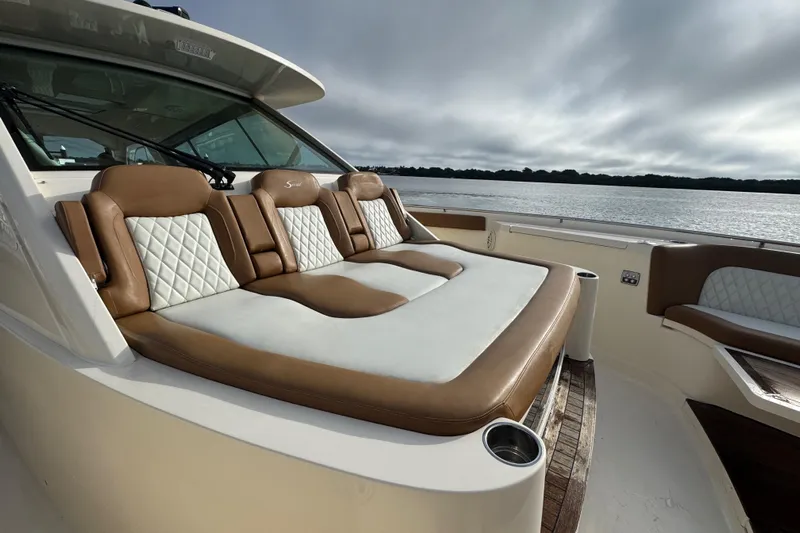 Yacht Photos Pics Luxurious seating on 2020 Scout 530 LXF yacht, overlooking serene waters.