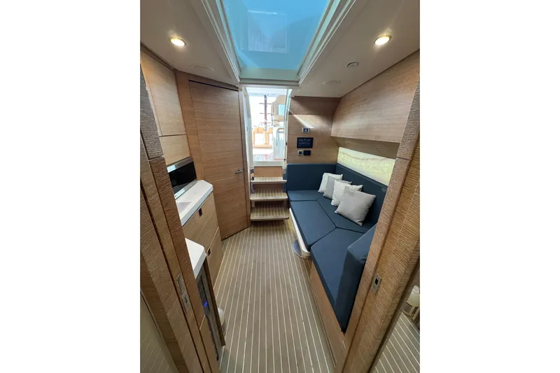  Yacht Photos Pics Luxurious interior of 2020 Scout 530 LXF yacht with modern seating and wood finish.