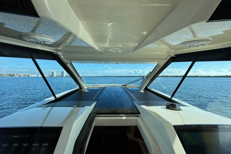  Yacht Photos Pics 2020 Scout 530 LXF boat interior with panoramic ocean view through windshield.