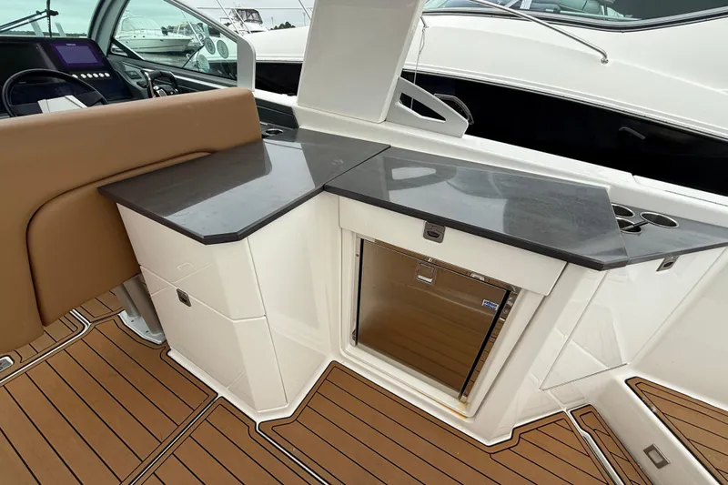  Yacht Photos Pics 2022 Aviara AV32 OB boat interior with sleek countertop and modern design.