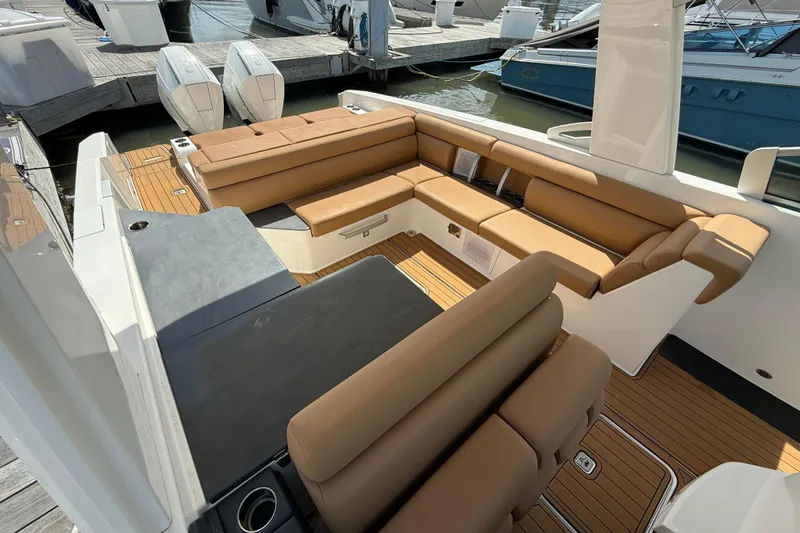  Yacht Photos Pics 2022 Aviara AV32 OB boat with luxurious tan seating and sleek design.