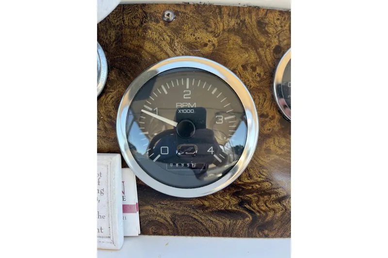  Yacht Photos Pics Tachometer on 1997 Sea Ray 420 Aft Cabin boat dashboard, showing RPM.