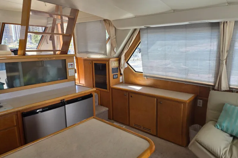  Yacht Photos Pics Interior of 1994 Navigator 5600 yacht with modern kitchen and seating area.