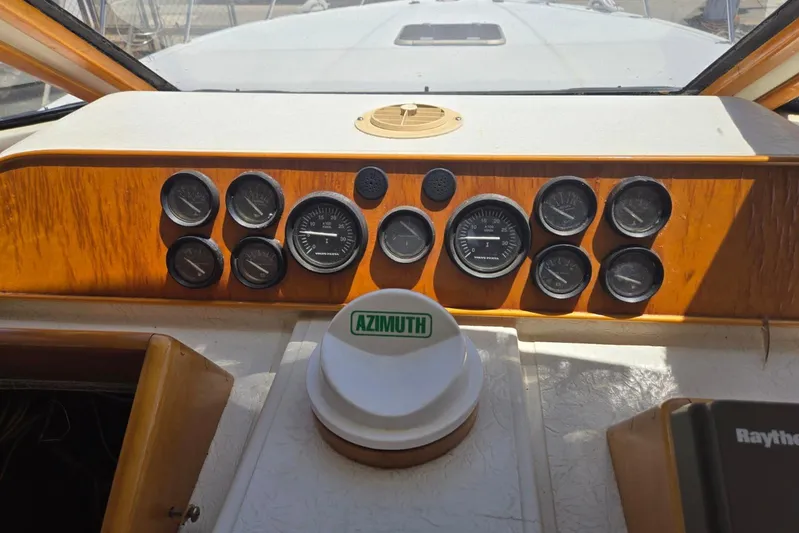  Yacht Photos Pics 1994 Navigator 5600 boat dashboard with gauges and Azimuth compass.