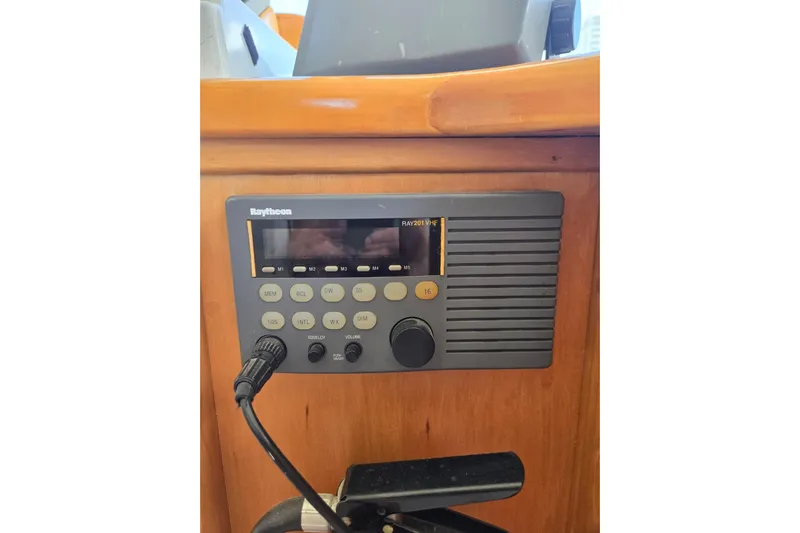 Yacht Photos Pics VHF radio on Navigator 5600, 1994 model, mounted on wooden panel.