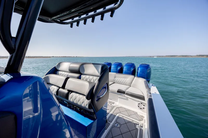 Yacht Photos Pics 2020 Nor-Tech 390 Sport Center Console boat on open water, featuring luxurious seating.