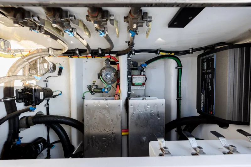  Yacht Photos Pics Engine compartment of 2020 Nor-Tech 390 Sport Center Console with visible wiring and components.