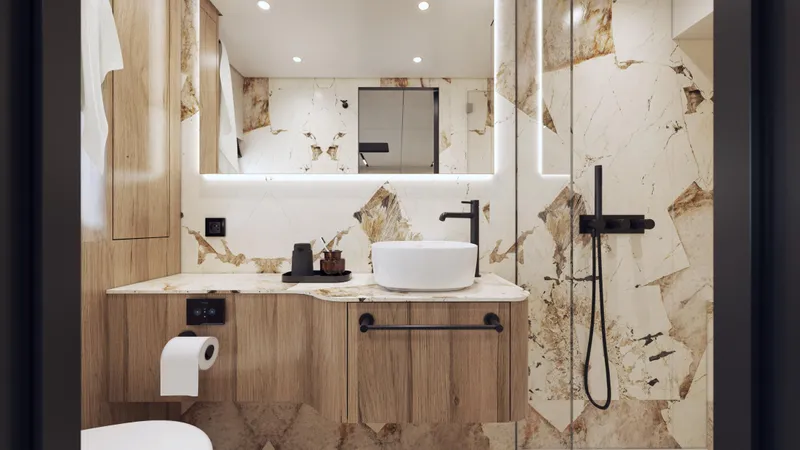 Arctic Moon Yacht Photos Pics Modern bathroom with marble walls, wooden cabinetry, vessel sink, and sleek black fixtures in Moon 60 Power 2025.