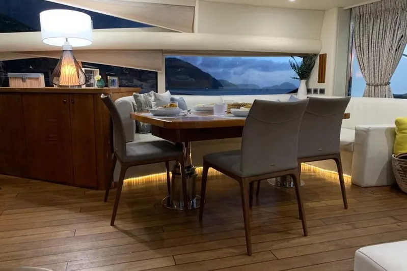  Yacht Photos Pics Luxurious interior of 2006 Sunseeker Predator 82 yacht with elegant dining area.