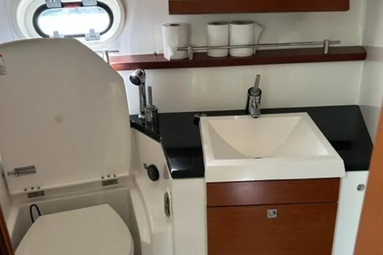  Yacht Photos Pics Luxury yacht bathroom with modern sink and toilet, Prestige 440 S, 2012 model.