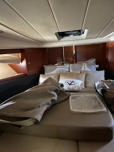  Yacht Photos Pics Interior cabin of 2012 Prestige 440 S yacht with bed and cushions.