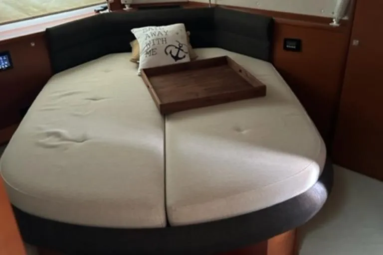  Yacht Photos Pics Luxurious cabin interior of 2012 Prestige 440 S yacht with cozy bed and decorative pillow.