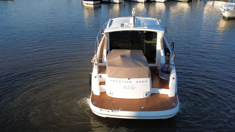  Yacht Photos Pics Prestige 440 S yacht, 2012 model, docked on calm water.