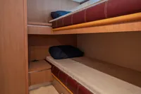 Interior of 2005 Astondoa 53 Open yacht with cozy bunk beds.
