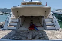 Astondoa 53 Open 2005 yacht with open storage compartment at marina.