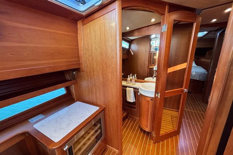 Salish Sky Yacht Photos Pics Interior of 2015 Sabre 54 Salon Express yacht with wooden finishes and modern amenities.