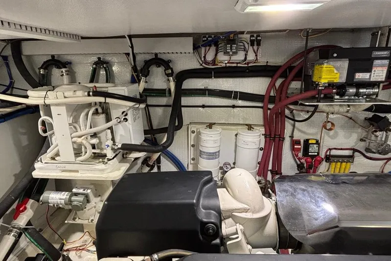 Salish Sky Yacht Photos Pics Engine room of 2015 Sabre 54 Salon Express with visible machinery and wiring.