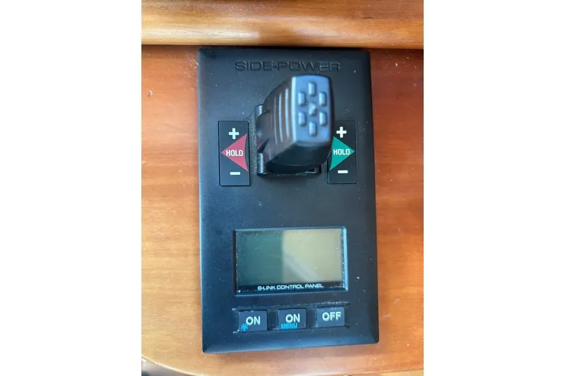 Salish Sky Yacht Photos Pics Control panel of a 2015 Sabre 54 Salon Express boat with joystick and display.