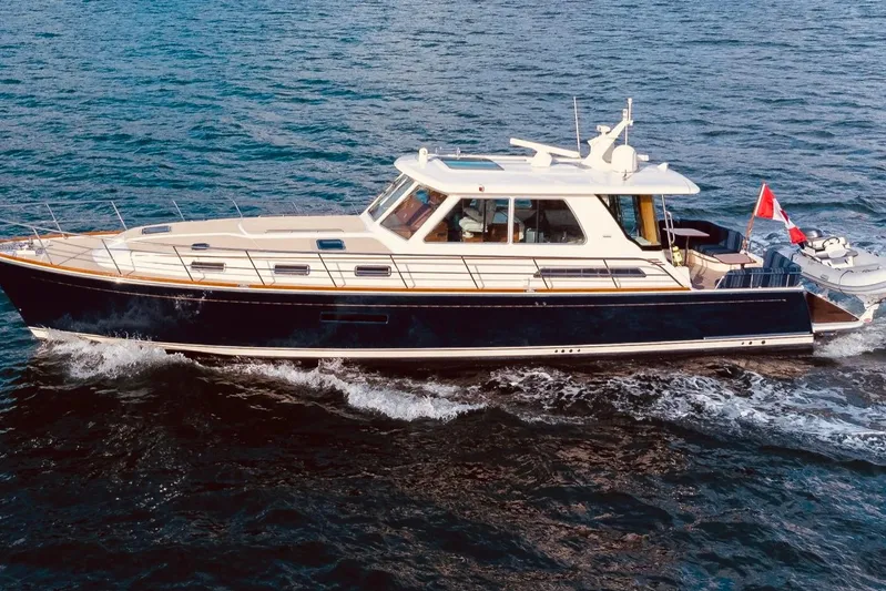 Salish Sky Yacht Photos Pics 2015 Sabre 54 Salon Express yacht cruising on open water.