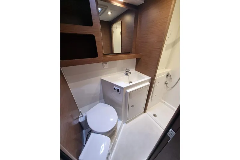 Mojito Yacht Photos Pics Modern bathroom in 2020 Lagoon 42 yacht, featuring sleek fixtures and wood accents.
