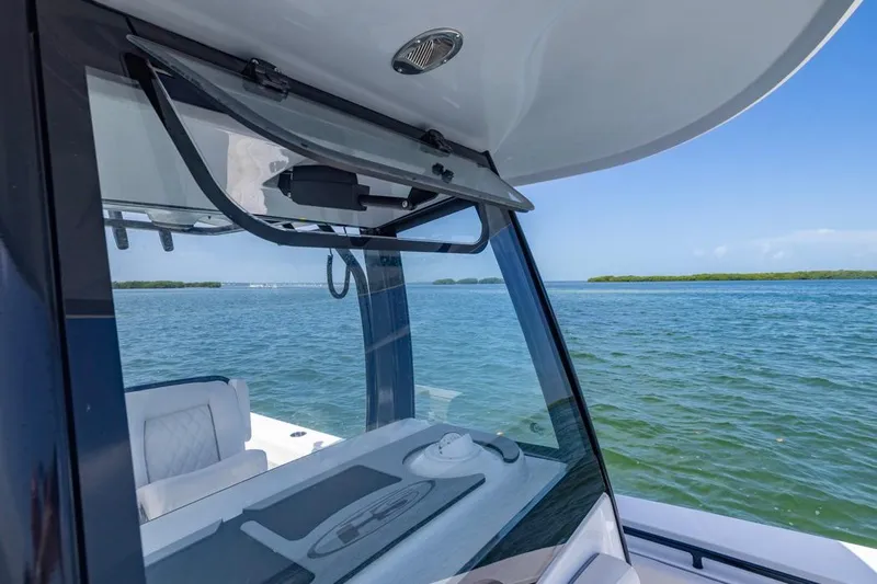  Yacht Photos Pics 2026 Sea Hunt Gamefish 27 boat with forward seating on calm waters.