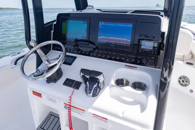  Yacht Photos Pics 2026 Sea Hunt Gamefish 27 Forward Seating dashboard with navigation screens and controls.