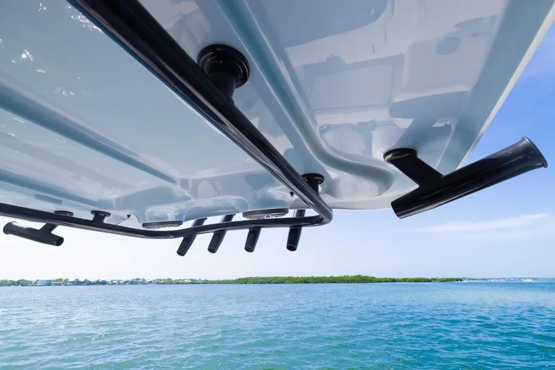  Yacht Photos Pics 2026 Sea Hunt Gamefish 27 boat underside with rod holders, ocean view.
