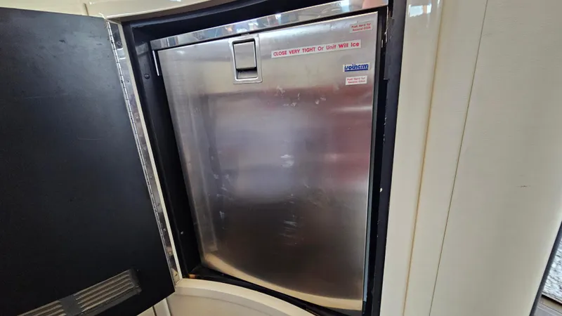 Dream Team Xiii Yacht Photos Pics Stainless steel refrigerator inside 2005 Neptunus 56 Flybridge yacht.