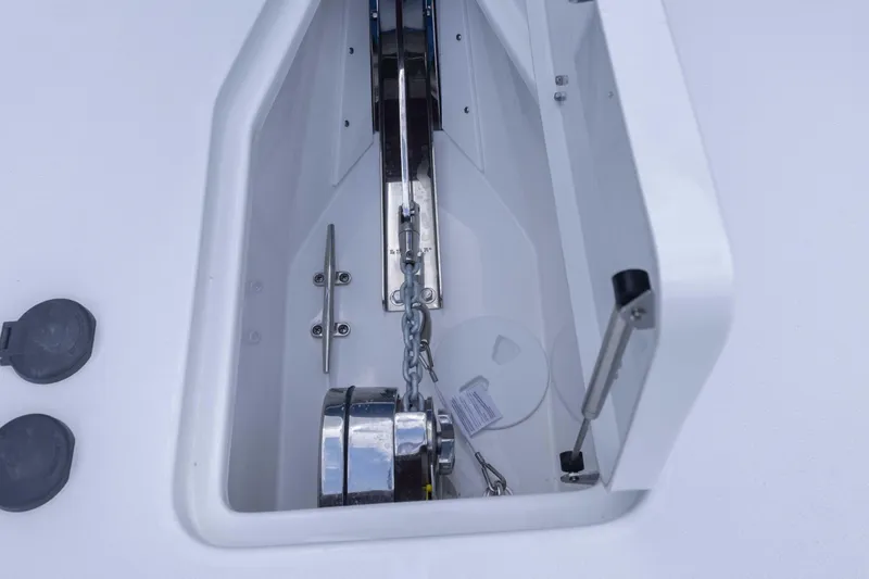 Yacht Photos Pics Anchor compartment of 2026 Sea Hunt Gamefish 27 Coffin Box boat, featuring chain and winch.