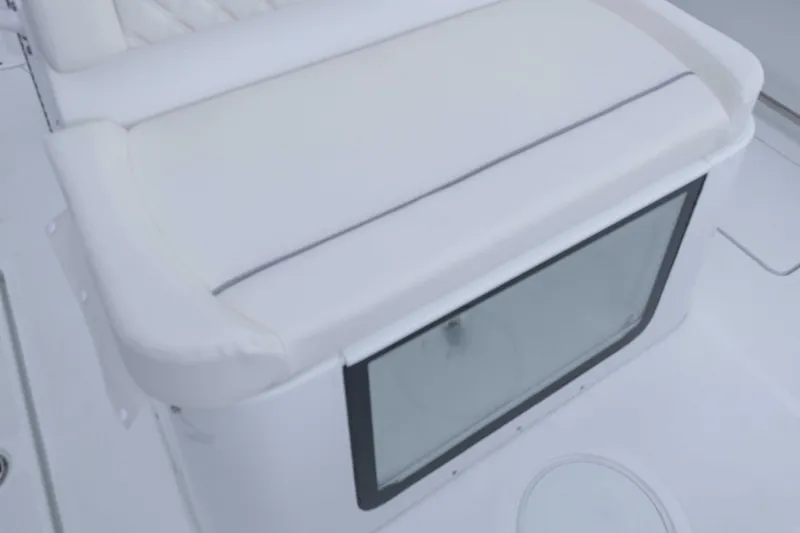  Yacht Photos Pics 2026 Sea Hunt Gamefish 27 Coffin Box with cushioned seating and storage.