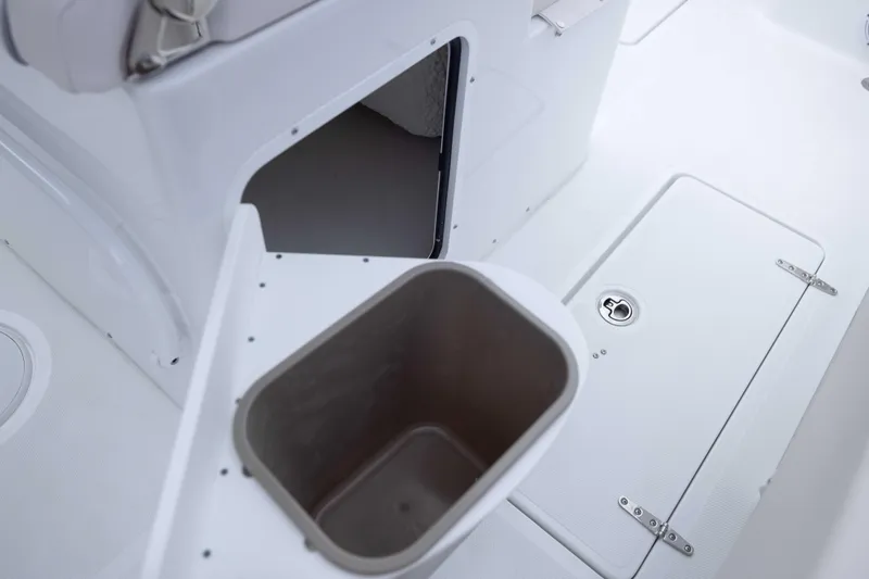  Yacht Photos Pics 2026 Sea Hunt Gamefish 27 Coffin Box interior, featuring storage compartments and seating area.