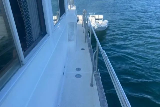Slow Poke Yacht Photos Pics 1987 Grand Banks Classic Trawler (Hull #20) deck view with ocean backdrop.