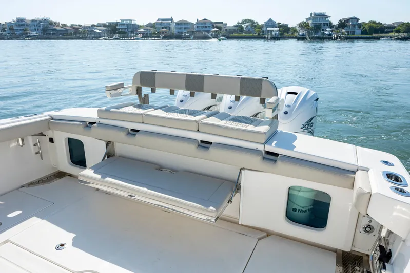  Yacht Photos Pics 2022 Solace 41 CS boat with spacious deck and scenic waterfront view.