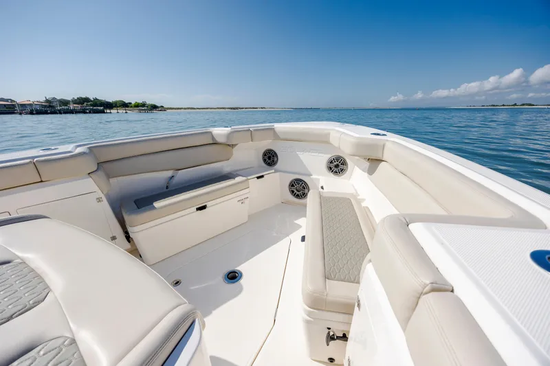  Yacht Photos Pics Luxurious 2022 Solace 41 CS boat interior with spacious seating on calm waters.