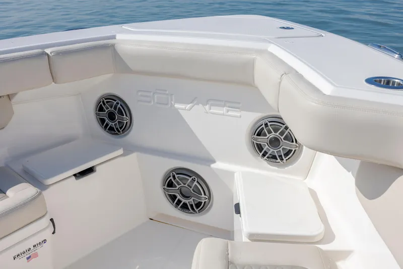  Yacht Photos Pics 2022 Solace 41 CS boat interior with speakers and cushioned seating.